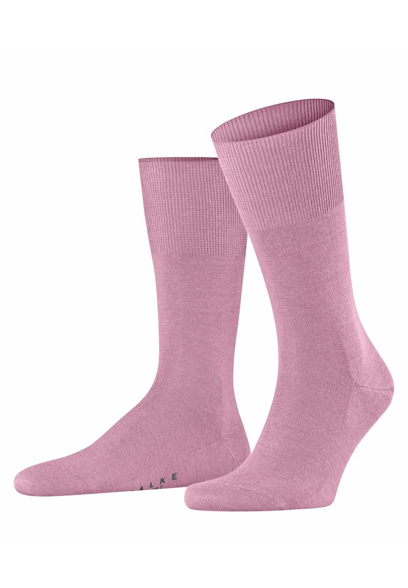 Calzini di cotone rosa con polsini a coste, texture liscia e punta rinforzata. Presentano un logo discreto sulla parte inferiore.