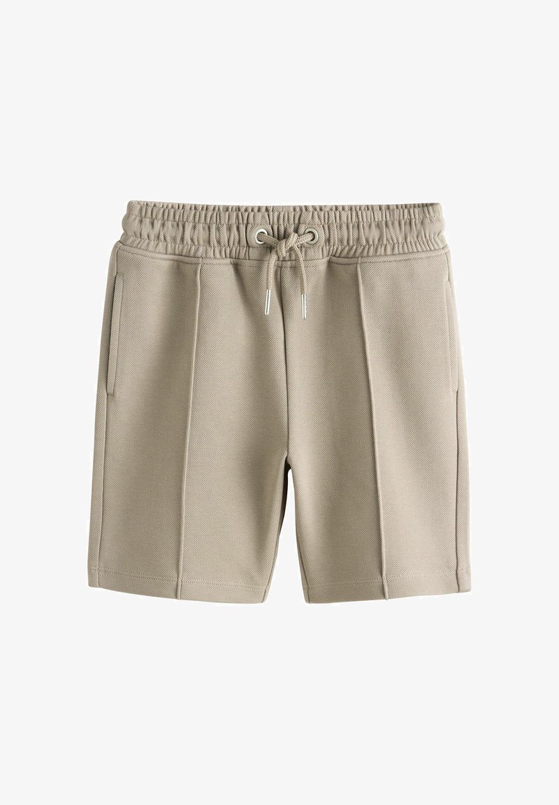 Shorts en coton beige avec taille élastique, fermeture par cordon, poches latérales et détails de couture à l'avant.