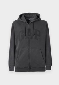 Dark gray zip-up hoodie with front pockets, drawstring hood, and subtle GAP logo across the chest against a white background.