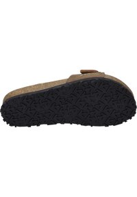 Brown cork footbed sandal with a textured black rubber sole featuring a zigzag pattern, with a wide strap and adjustable buckle.