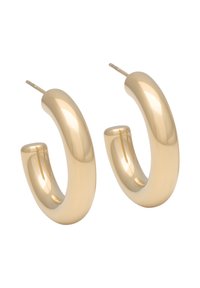 Pendientes de aro en tono dorado con un diseño curvado y suave. Su acabado brillante realza la reflexión de la luz, creando un aspecto pulido.