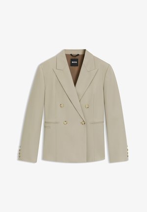 Beige dobbeltradet blazer med spidse klapper, fire guldknapdetaljer, sidelommer og et glat, struktureret stof.