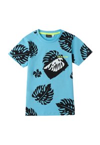 Camiseta de algodón azul con mangas cortas, que presenta grandes patrones de hojas de monstera negras y un texto gráfico que dice "LA VIDA ES UNA OLA" en verde neón.