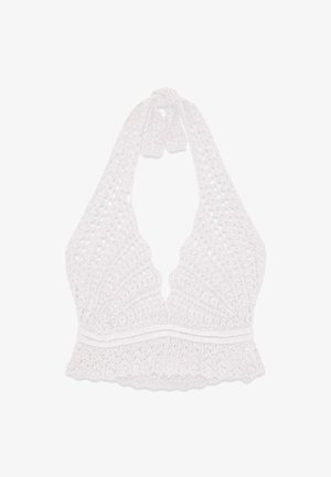 Witte gehaakte haltertop met gegolfde onderkant en een gestructureerd opengebreid patroon, gestrikt in de nek met twee bandjes.