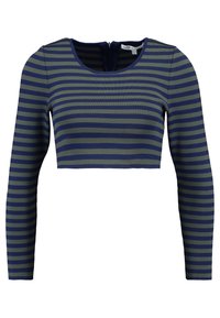 Striped long-sleeve crop top in olive green and navy. Features a round neckline and back zip closure. Made from a soft, stretchy fabric.