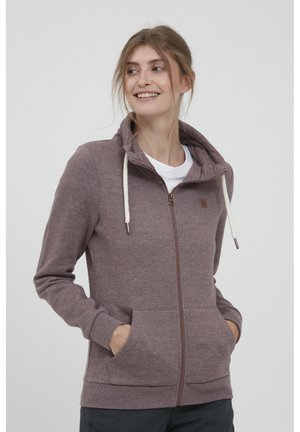 Malva zip-hoodie med dragsko, framfickor och en mjuk textur. Designad med en figurnära passform och ribbade ärmslut.