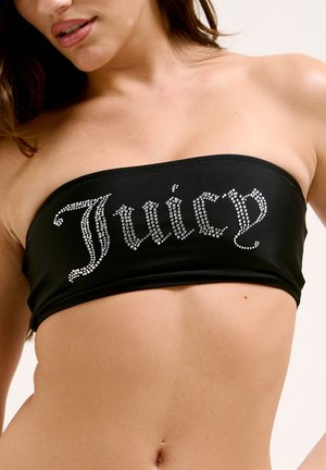 Black bandeau top made of smooth fabric featuring rhinestone text "Juicy" in a cursive font across the front.