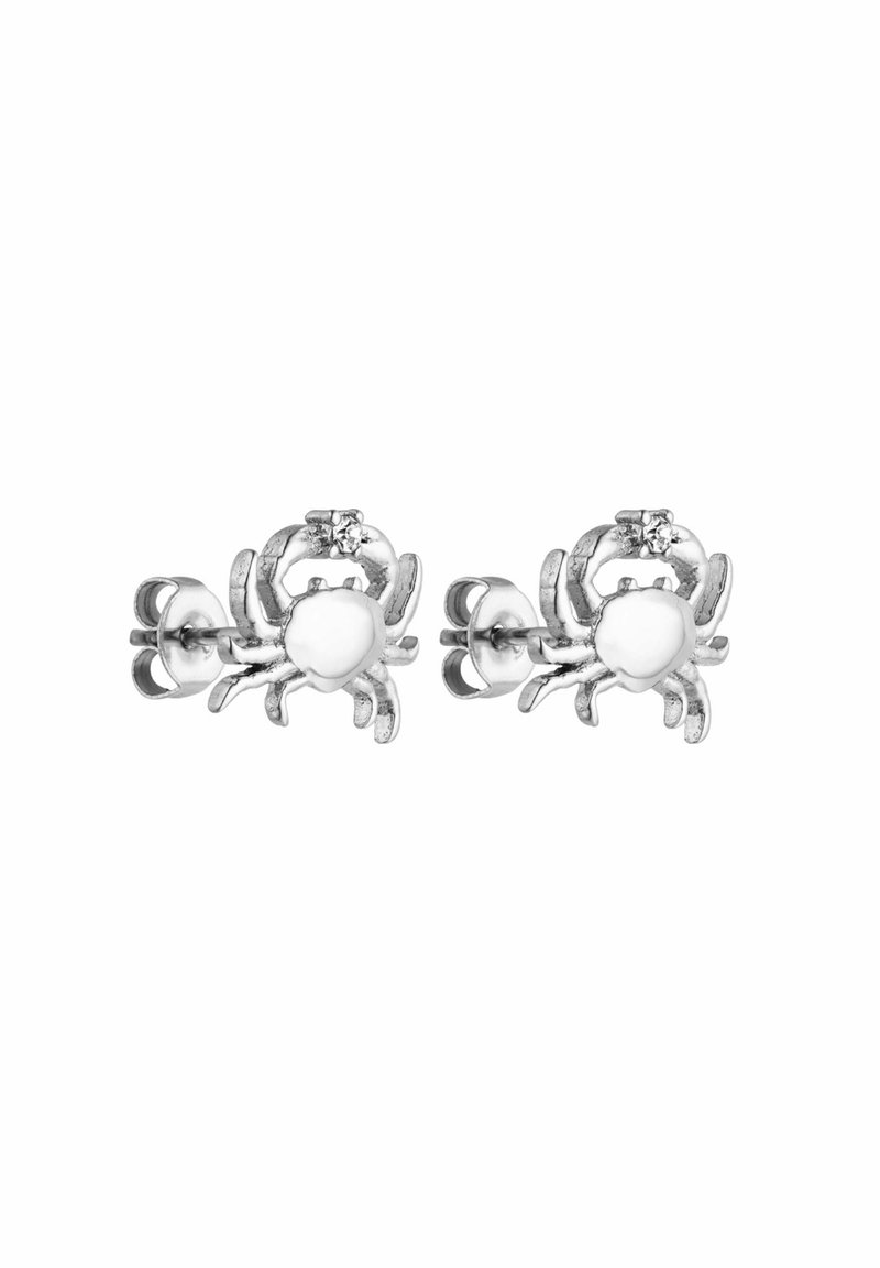 Paire de boucles d’oreilles en argent en forme de crabes, avec de petites pierres rondes sur le dessus, posées sur un fond blanc uni.