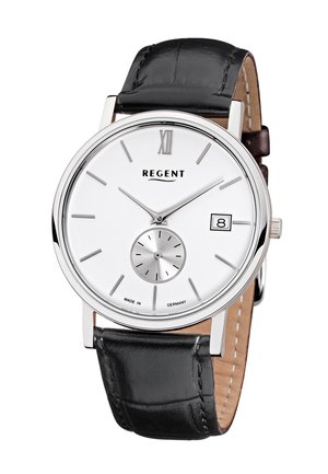 Montre analogique argentée avec un cadran blanc, bracelet en cuir noir, marqueurs des heures argentés, petit sous-cadran et affichage de la date à 3 heures.