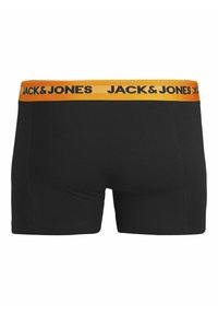 Zwarte boxershorts met een zachte textuur, voorzien van een gele tailleband met de tekst "JACK & JONES" in zwarte letters.