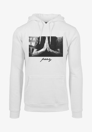 Witte hoodie met een vooraanstaand grafisch ontwerp van handen in een gebedspositie. Tekst "pray" in zwarte cursieve letters onder het beeld. Zachte stoftextuur.