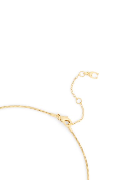 Collier chaîne serpent en or avec fermoir mousqueton et rallonge de chaîne réglable courte sur fond blanc.