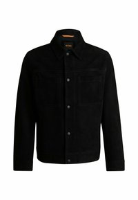 Svart mockajacka med krage, två bröstfickor och knäppning med knappar. Har kontrastsömmar och rak fåll.