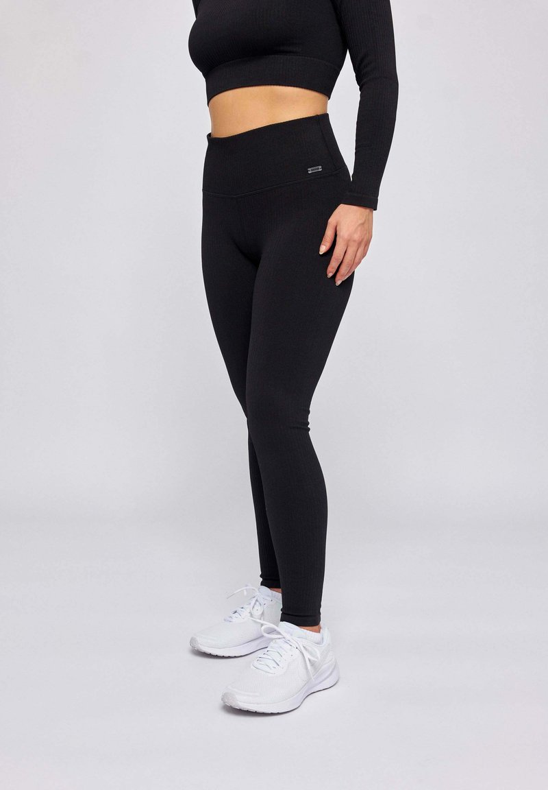 SNOCKS Legging - schwarz