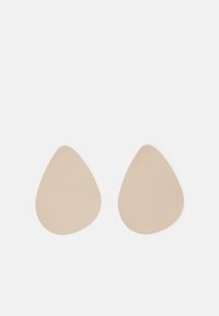 Nude adhesive silicone bra pads in a teardrop shape, smooth texture, lightweight, designed for shaping and support.