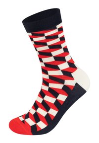 Bunte Crew-Socke mit einem geometrischen Muster in Rot, Marineblau und Weiß. Gerippter Bund und verstärkte Ferse für Haltbarkeit.