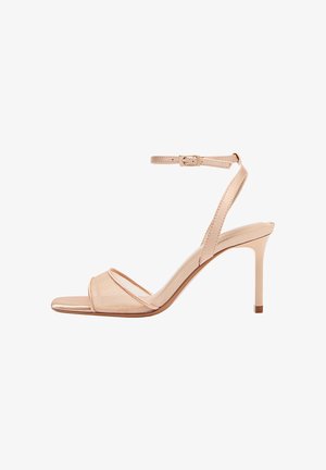 Nackte High-Heel-Sandale mit Knöchelriemen, offenem Zehenbereich und schlankem Stiletto-Absatz, entworfen für formelle oder festliche Anlässe.