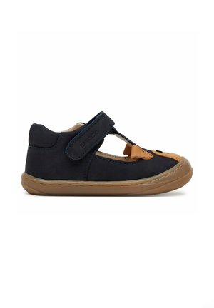 Scarpa da bambino blu navy con dettaglio marrone sulla punta, cinturino in velcro e suola flessibile color cuoio, progettata per comfort e facile chiusura.