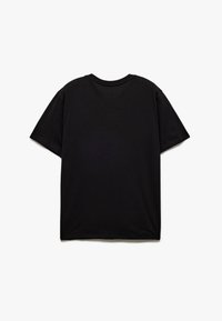 Svart bomull T-shirt med korta ärmar, rund halsringning och en avslappnad passform. Baksidan är enkel utan synliga logotyper eller mönster.