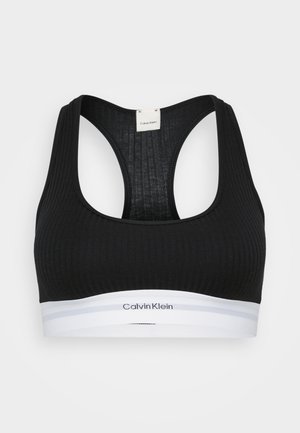 Juodas raištinis sportinis liemenukas su lenktos nugaros dizainu, su baltu elastiniu diržu su pilkomis juostelėmis ir "Calvin Klein" logotipu.