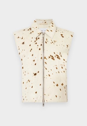 Ujjatlan mellény bézs színű anyagból, barna pettyes mintával, elülső cipzárral és klasszikus gallér kialakítással.