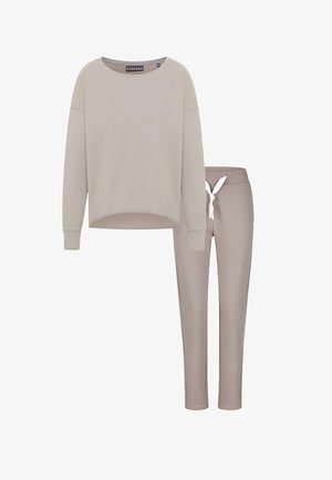 Light beige long-sleeve top with a rounded neckline and relaxed fit, paired with matching tapered pants featuring an elastic waistband and drawstring.