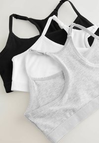 Drei Stretch-Baumwoll-Bralettes in Schwarz, Weiß und Grau. Mit einem Racerback-Design und einem elastischen Bund mit eingeprägtem Logo.