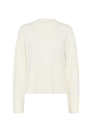 Suéter blanco con un tejido texturizado, patrón floral en los hombros y un corte relajado con mangas largas.