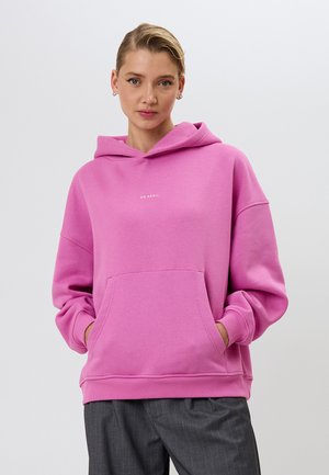 Pink hooded sweatshirt with a kangaroo pocket, loose fit, ribbed cuffs and hem, featuring a small white logo on the chest.
