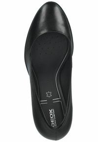 Zwarte leren platte schoen met een ronde neus en een gladde afwerking. Bevat een gevoerde binnenzool met perforaties voor ademend vermogen.