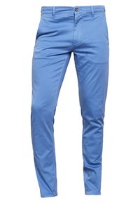 Blå bomullsbyxor med slim fit, med knäppning, bälteshällor och subtil textur. Slutar ovanför anklarna för en skräddarsydd look.