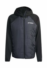 Veste isolante noire avec fermeture éclair à l'avant, présentant une texture matelassée sur le torse et des manches lisses. Conception avec capuche et détail de logo.