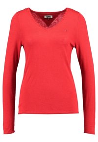 Rotes Langarm-V-Ausschnitt-Oberteil aus weichem, dehnbarem Stoff mit lockerem Sitz. Verfügt über ein kleines Logo auf der Brust.