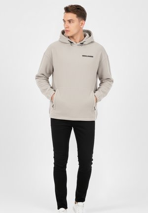 MIT PRINT GUMMIZUG - Kapuzenpullover - beige