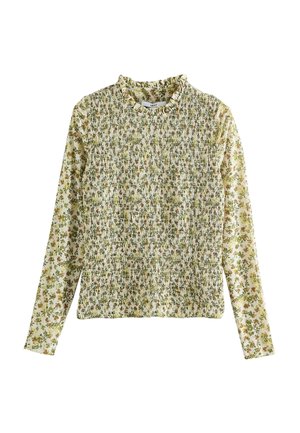 Langarm gesmokt top met een bloemmotief in groen en geel op een lichte achtergrond; geaccentueerd met geplooide stof en een gerimpelde halslijn.