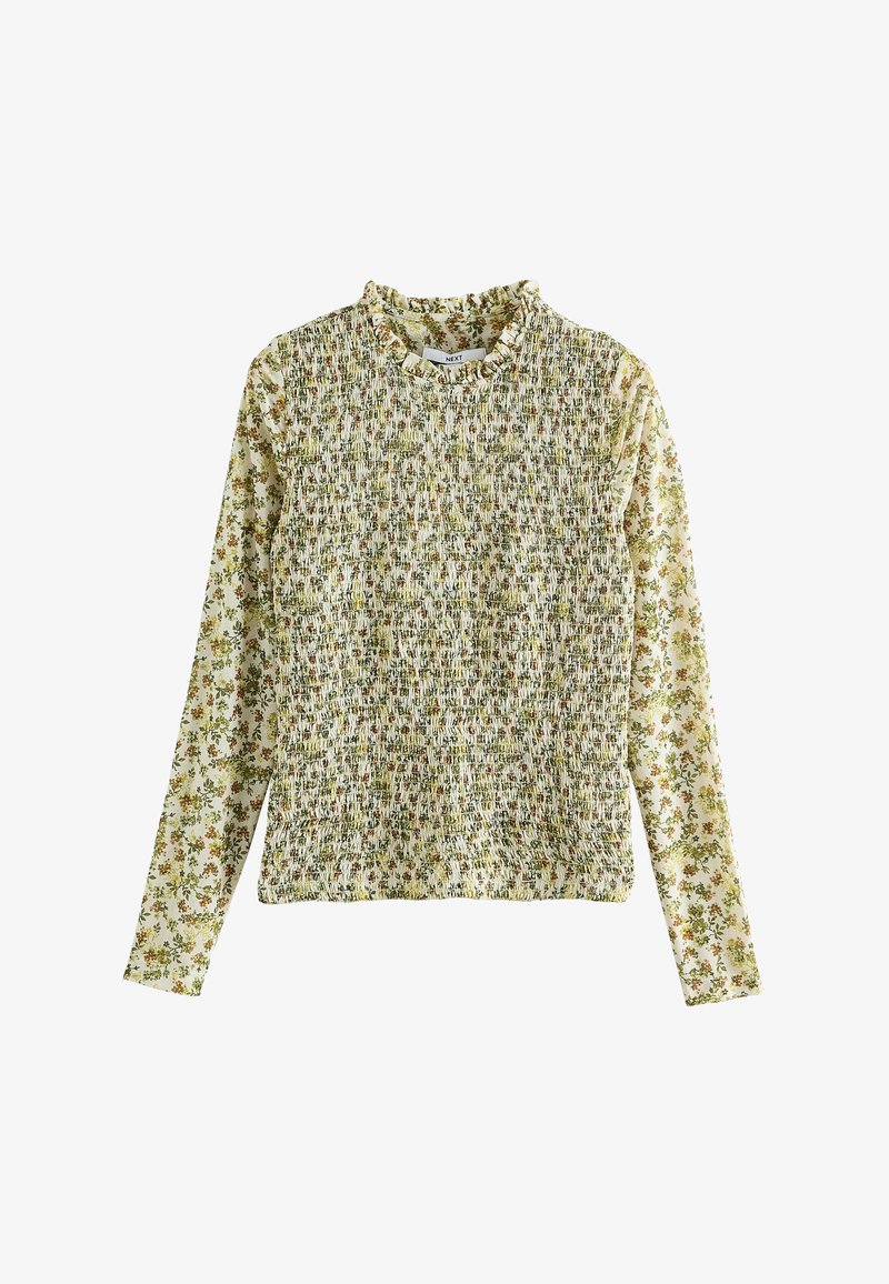 Long-sleeve smocked top featuring a floral pattern in green and yellow on a pale background; textured with gathered fabric and a ruffled neckline.