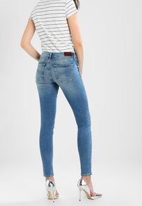 Tommy Jeans Jeans Skinny Fit - blue denim