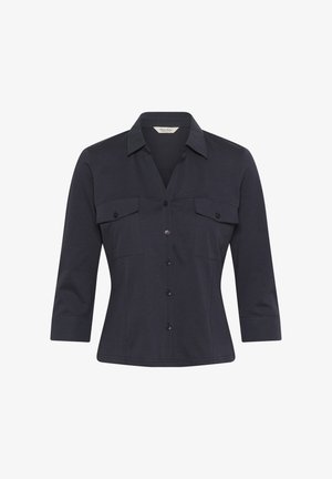 Camicia button-up blu navy scuro con maniche a tre quarti, colletto a punta e due tasche sul petto con patta e bottoni.