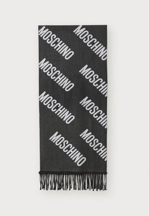 Black scarf featuring a repeated white "MOSCHINO" logo in diagonal lines. Finished with fringed edges for added texture.