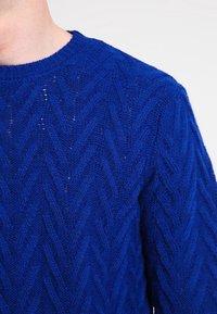 Loreak Mendian Sweter