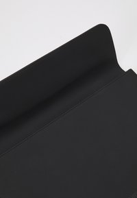 Black leather envelope-style pouch with smooth texture, rounded edges, and minimal stitching. Interior appears spacious for storage.