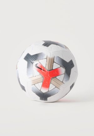 White soccer ball with black, gray, and red geometric patterns on a plain light background.