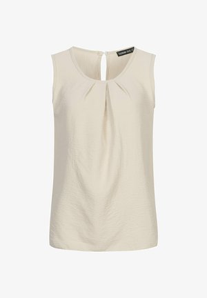 Bešinis be rankovių švarkelis su tekstūruotu paviršiumi, turintis plisuotą priekį ir užsegimą su mažyte mygtuką gale.