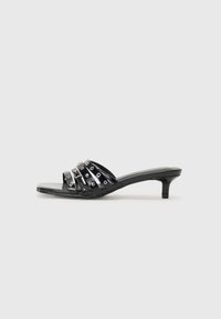 Heeled mules - black