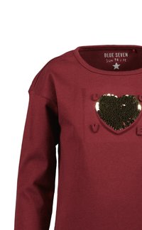 Burgundská dlouhá košile s dlouhým rukávem, která má černé flitrové srdce s vystouplým nápisem "LOVE". Měkký bavlněný materiál a kulatý výstřih.