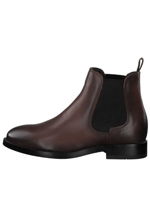 Bottine Chelsea en cuir marron avec panneau latéral élastique noir, talon bas et languette à l'arrière.