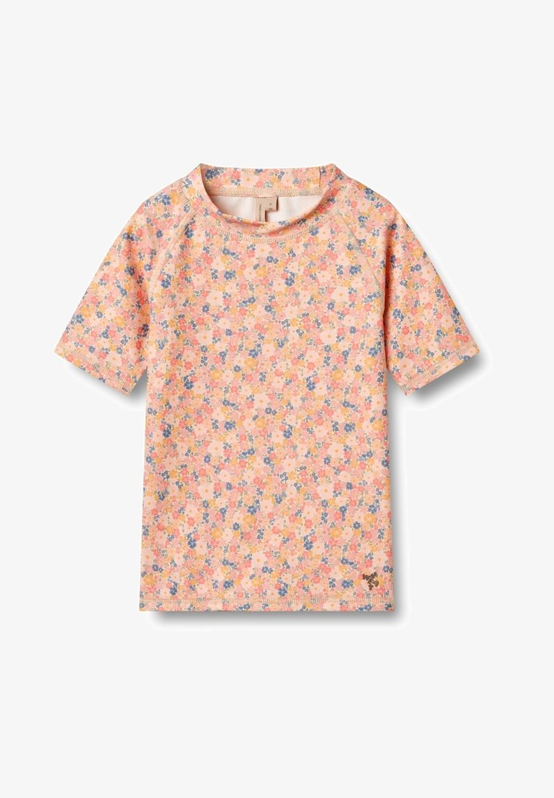 Short-sleeve t-shirt in light pink fabric with a floral pattern in blue, yellow, and white. Features a round neckline and raglan sleeves.