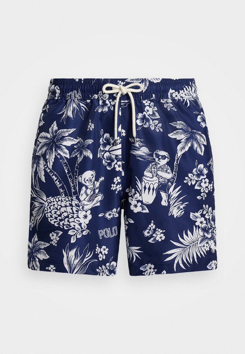 Marine badebukser laget av lett stoff med hvite tropiske blomster- og dyremønstre. Elastisk midjebånd med snøring.