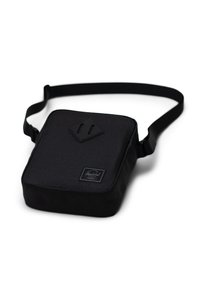Borsa a spalla nera in tessuto, di forma quadrata, con finitura texture, tracolla regolabile e patch con logo in rilievo sul davanti.