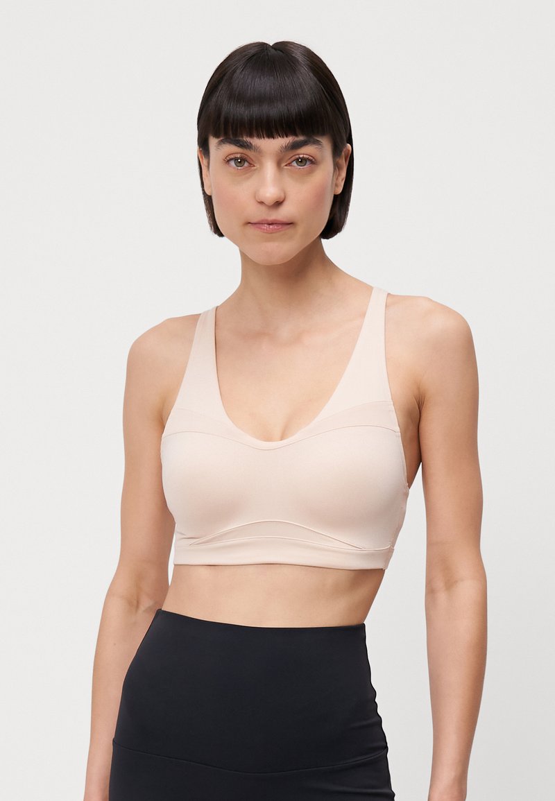 Under Armour Sport-bh met medium support beige Under Armour Sport-bh met medium support beige